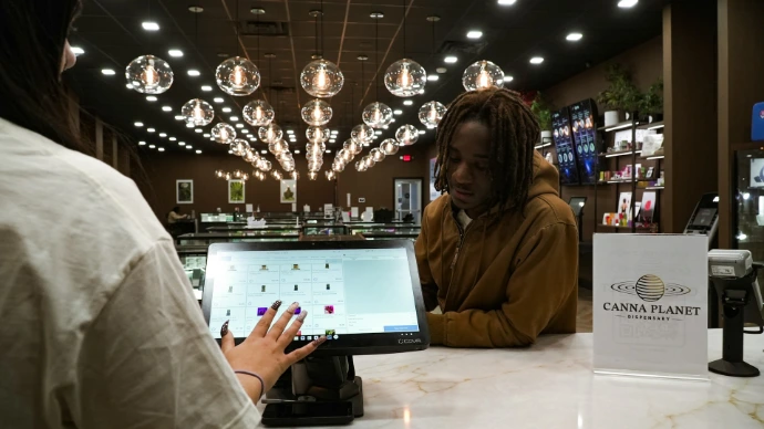 Customer and cashier interacting at a modern retail counter